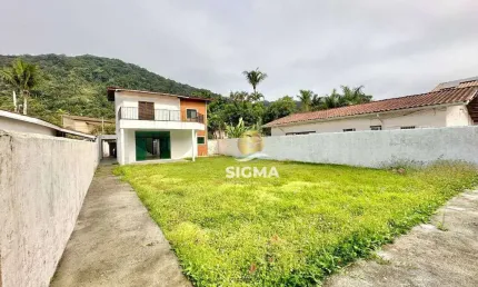 Casa com 3 quartos sendo 1 suíte à venda na Praia do Guaiuba - Guarujá/SP.