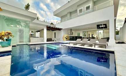 Casa com 5 Suítes à venda no Condomínio Jardim Acapulco - Guarujá/SP.