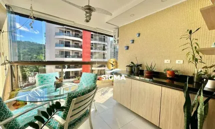 Apartamento com 3 dormitórios sendo 1 suíte à venda, 113 m² por R$ 650.000 - Pitangueiras - Guarujá/SP.