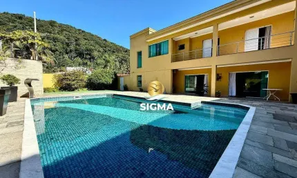 Casa com 5 quartos sendo 3 suítes à venda, 400 m² por R$ 2.000.000 - Praia do Pernambuco - Guarujá/SP.