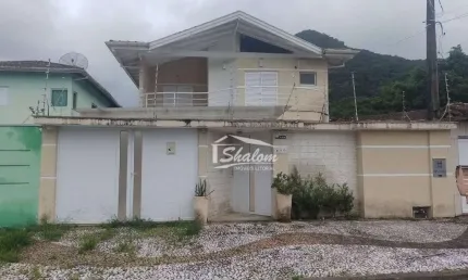 Casa com 4 dormitórios à venda, 296 m² por R$ 1.200.000,00 - Cidade Jardim - Caraguatatuba/SP