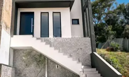 Casa em condomínio fechado com 3 quartos à venda na Rua Tancredo Neves, 990, Jansen, Gravataí, 150 m2 por R$ 799.000