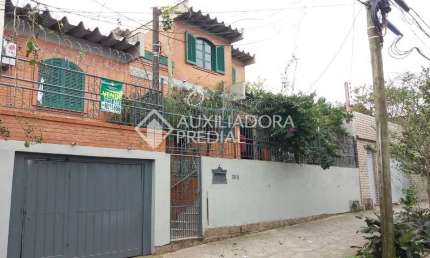 Casa em condomínio fechado com 3 quartos à venda na Rua Cuiabá, 308, Medianeira, Porto Alegre, 140 m2 por R$ 395.000