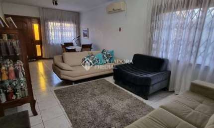 Casa com 3 quartos à venda na Rua Albion, 1054, Passo do Feijó, Alvorada, 148 m2 por R$ 589.990