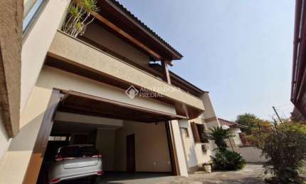 Casa com 4 quartos à venda na Rua Nações Unidas, 415, Nossa Senhora das Graças, Canoas, 287 m2 por R$ 969.000