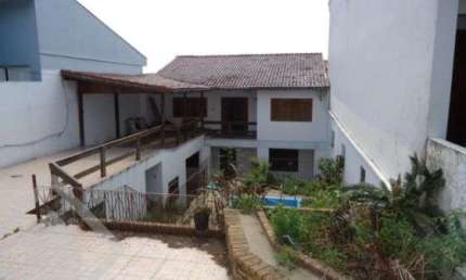 Casa em condomínio fechado com 3 quartos à venda na Rua Peri Melo, 245, Nonoai, Porto Alegre, 200 m2 por R$ 617.000