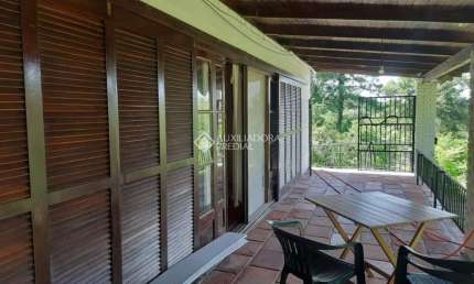 Casa com 3 quartos à venda na Estrada Kanazawa, 1045, Vila Nova, Porto Alegre, 269 m2 por R$ 4.000.000