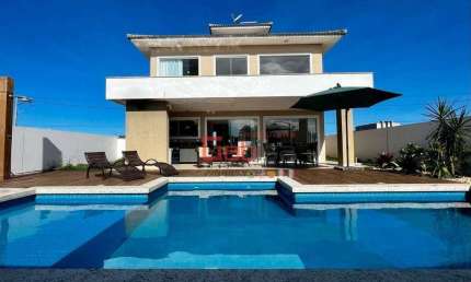 Casa com 3 dormitórios para alugar, 130 m² por R$ 10.641,74/mês - Guriri - Cabo Frio/RJ