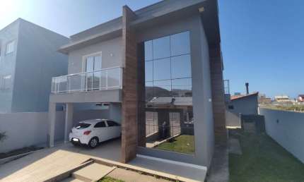 Casa com 3 quartos à venda na Prof. Vera Maria Tavares Teixeira, 306, Village, Imbituba, 212 m2 por R$ 1.400.000