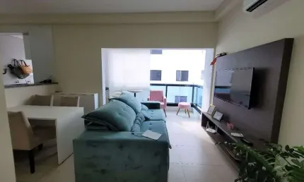 Flat com 2 dormitórios à venda, 65 m²- Pitangueiras - Guarujá/SP
