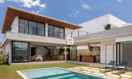 CASA DE ALTO PADRÃO EM CONDOMÍNIO PRIVILEGIADO NO GUARUJÁ – 5 SUÍTES, ÁREA GOURMET E BEACH HOUSE
