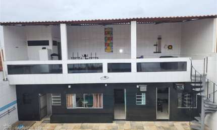 Magnífico triplex em praia grande com 5 quartos, 3 suítes e 3 vagas!