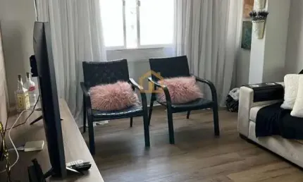 Apartamento padrão 1 dormitório e 1 vaga demarcada  prédio com elevador e portaria na quadra do mar