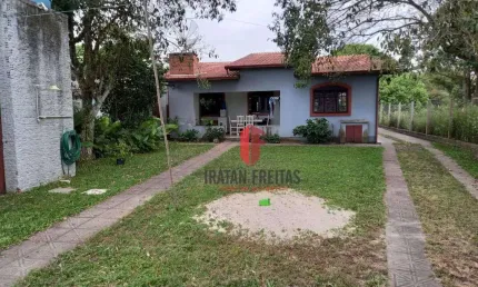 Casa com 3 dormitórios à venda por R$ 477.000,00 - Itapeva - Torres/RS