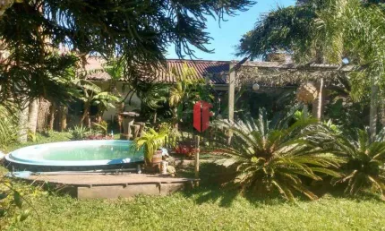 Casa com 1 dormitório à venda por R$ 260.000,00 - Praia Paraíso - Torres/RS