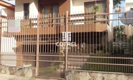 Casa 4 dormitórios sendo uma suíte , 5 banheiros e 6 vagas de garagem