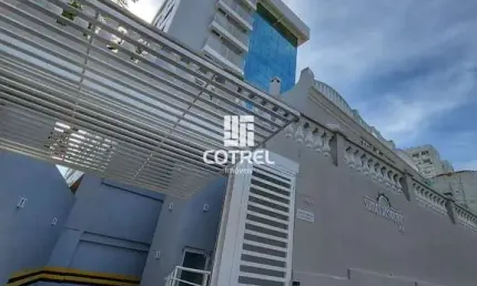 Apartamento central 2 dormitórios sendo 1 suíte e 1 vaga de garagem localizado n