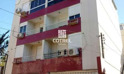 Apartamento central 2 dormitórios sendo 1 suíte e 1 vaga de garagem localizado n