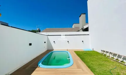 Casa para venda e locação 3 dormitórios 1 sendo suíte, piscina situada no Bairro