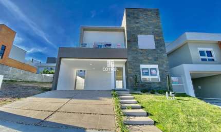 Casa nova com 3 suítes no condomínio fechado Real Park