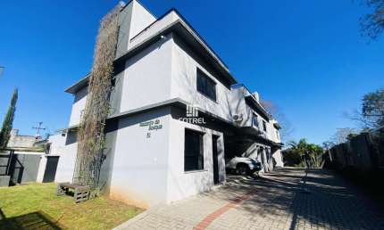 Casa semimobiliada em condomínio fechado com 2 dormitórios e 2 vagas no Bairro T