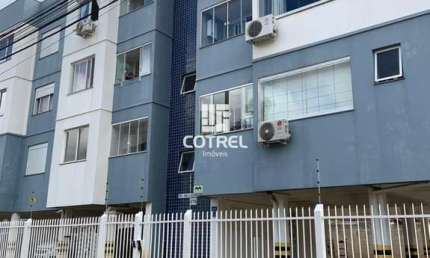 Excelente apartamento de 2 dormitórios com garagem próximo a UFSM no bairro Camo