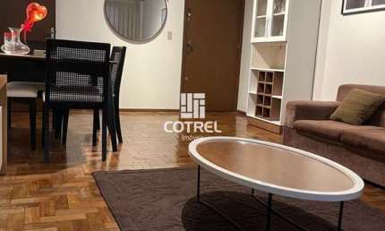 Apartamento mobiliado com 2 dormitórios, suíte, dependência e garagem