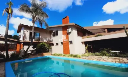 Casa para venda 4 dormitórios sendo 1 suíte, piscina situada no Bairro Camobi na