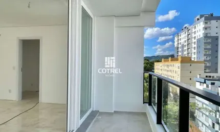 Apartamento 2 dormitórios, suíte e 2 vagas de garagem no Bairro Centro