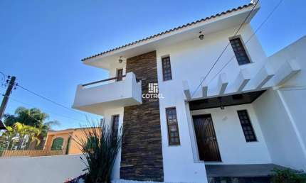 Casa para Locação e à Venda 3 dormitórios sendo 1 suíte, 4 vagas de garagem, sit