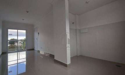 Apartamento três quartos/suíte e duas vagas cobertas