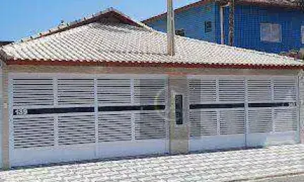 Casa com 2 dormitórios à venda, 110 m² por R$ 585.000,00 - Maracanã - Praia Grande/SP