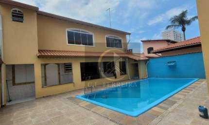 Sobrado com 4 dormitórios à venda, 395 m² por R$ 1.300.000,00 - Balneário Flórida - Praia Grande/SP