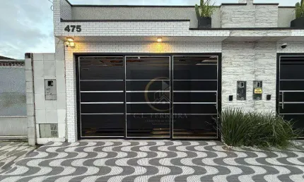 Casa com 3 dormitórios à venda, 103 m² por R$ 900.000,00 - Tupi - Praia Grande/SP