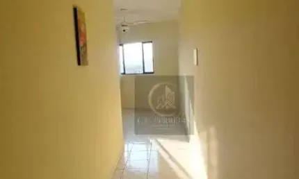 Apartamento com 2 dormitórios à venda, 50 m² por R$ 240.000 - Caiçara - Praia Grande/SP
