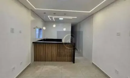 Casa com 2 dormitórios à venda, 70 m² por R$ 597.000,00 - Mirim - Praia Grande/SP