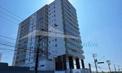 Apartamento de 2 quartos no Mirim, Praia Grande-SP: 1 suíte, sala, 2 banheiros, garagem e 76,45m² de área. Venha conferir!
