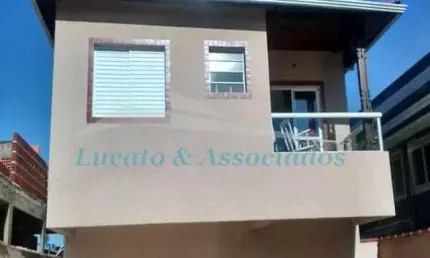 Sobrado residencial em condomínio fechado para Venda Vila Antártica, Praia Grande SP 03 dormitórios sendo 01 suíte com sacada, sala, cozinha, área de
