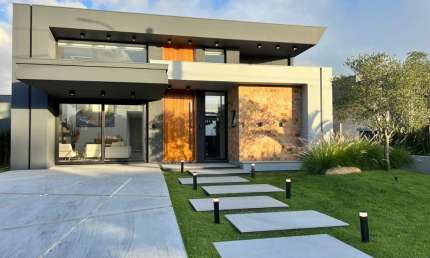 Casa em condomínio fechado com 3 quartos à venda na Rua Onório Germano, 2009, Araça, Capão da Canoa, 180 m2 por R$ 1.850.000