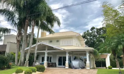 Casa em condomínio fechado com 5 quartos à venda na Avenida Interbalneários, 436, Atlântida, Xangri-Lá, 240 m2 por R$ 2.810.000