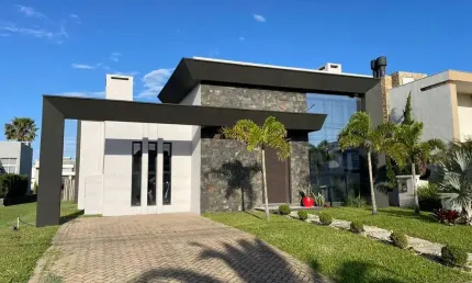 Casa em condomínio fechado com 3 quartos à venda na Rua Onório Germano, 2009, Araça, Capão da Canoa por R$ 1.200.000