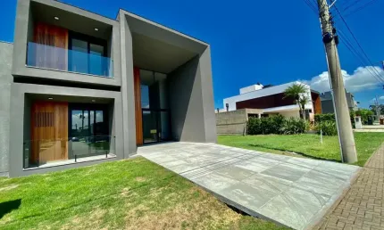 Casa em condomínio fechado com 4 quartos à venda na rua divisa, 32, centro, xangri-lá, 230 m2 por r$ 1.950.000
