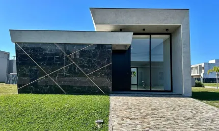 Casa em condomínio fechado com 4 quartos à venda na Avenida Paraguassu, 551, Centro, Xangri-Lá por R$ 1.490.000