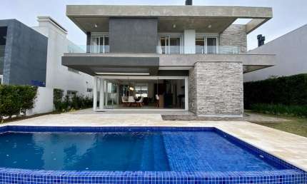 Casa em condomínio fechado com 5 quartos à venda na Rua Rio Jacuí, 1331, Atlântida, Xangri-Lá, 325 m2 por R$ 5.000.000
