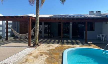 Casa com 4 quartos à venda na rua carlos trindade, e86, Araça, Capão da Canoa por R$ 930.000