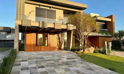 Casa em condomínio fechado com 4 quartos à venda na Avenida Paraguassu, 551, Centro, Xangri-Lá por R$ 1.950.000