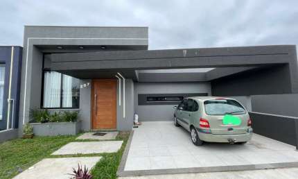 Casa com 3 quartos à venda na Avenida Cristóvão Colombo, 207, Guarani, Capão da Canoa por R$ 1.150.000