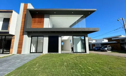 Casa em condomínio fechado com 4 quartos à venda na Rua divisa, 32, Centro, Xangri-Lá por R$ 1.590.000