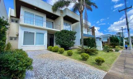 Casa em condomínio fechado com 4 quartos à venda na Avenida Central, 2000, Zona Nova, Capão da Canoa por R$ 1.620.000