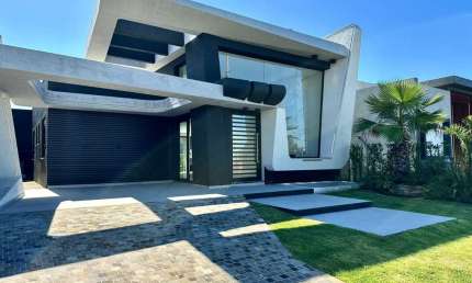 Casa em condomínio fechado com 3 quartos à venda na Rua Manoel Quadros, 4, Arroio Teixeira, Capão da Canoa por R$ 1.390.000